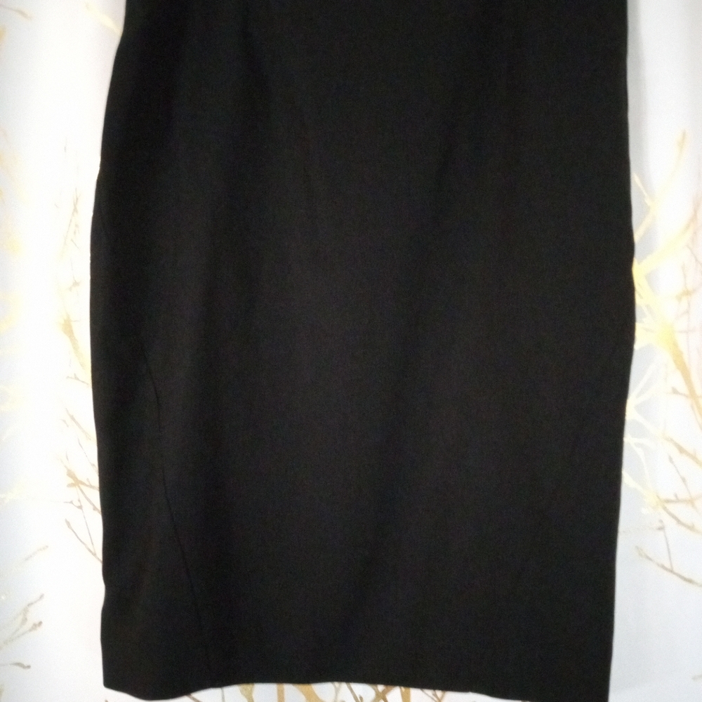 Alfani black skirt size 6, sits at the knees.